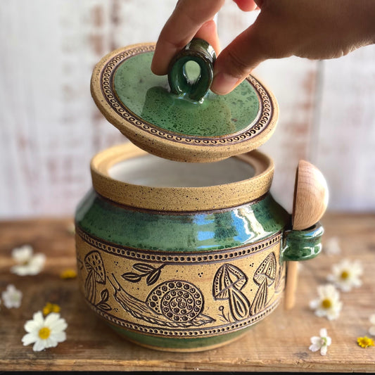 46. 45oz. Snail and Mushroom Jar with Scoop